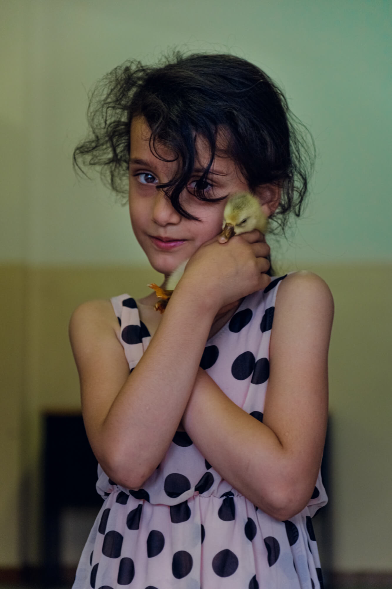 Natalia and a tiny fledgling brought by her father